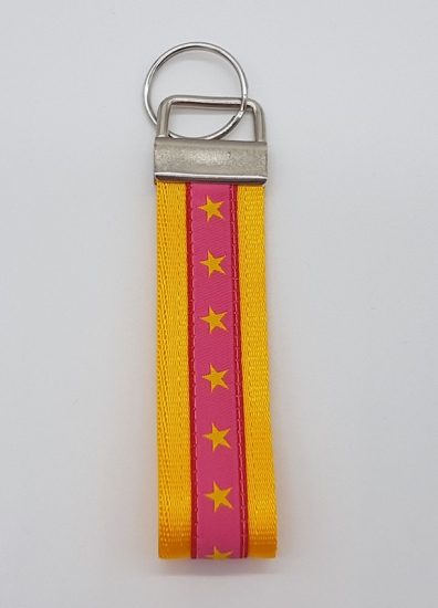 Preview: Schlüsselanhänger Gurtband gelb / Sterne pink